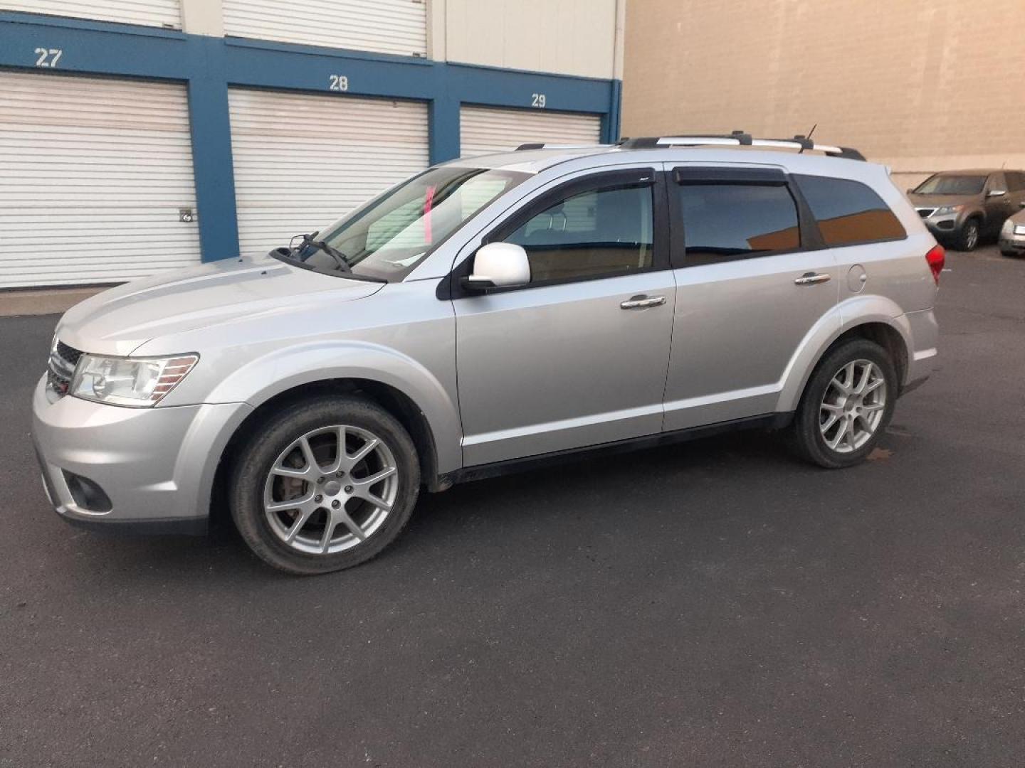 2013 Dodge Journey (3C4PDDFGXDT) with an 3.6L V6 DOHC 24V engine, 6-Speed Automatic transmission, located at 2015 Cambell Street, Rapid City, SD, 57701, (605) 342-8326, 44.066433, -103.191772 - CARFAX AVAILABLE - Photo#1